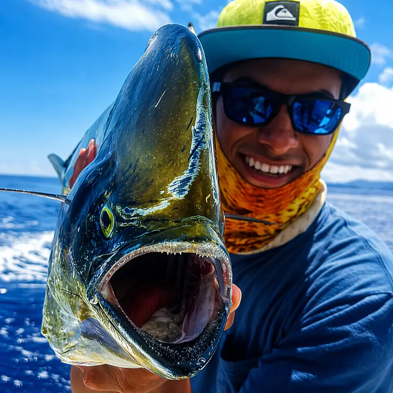 Angler displaying successful catch on private Costa Rica fishing tour